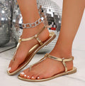 Women's Gold Flat Thong Sandals – Metallic T-Strap with Ankle Buckle Closure